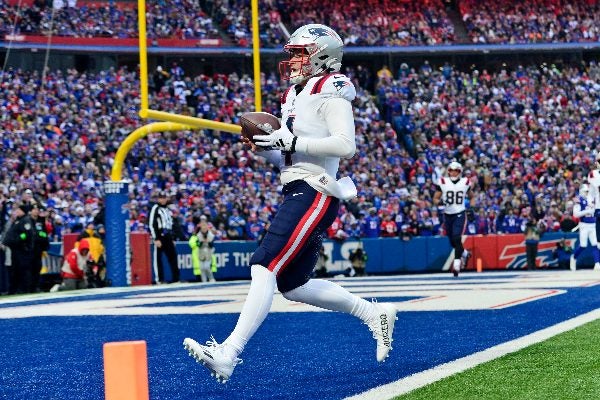 Zappe anotando con los Patriots