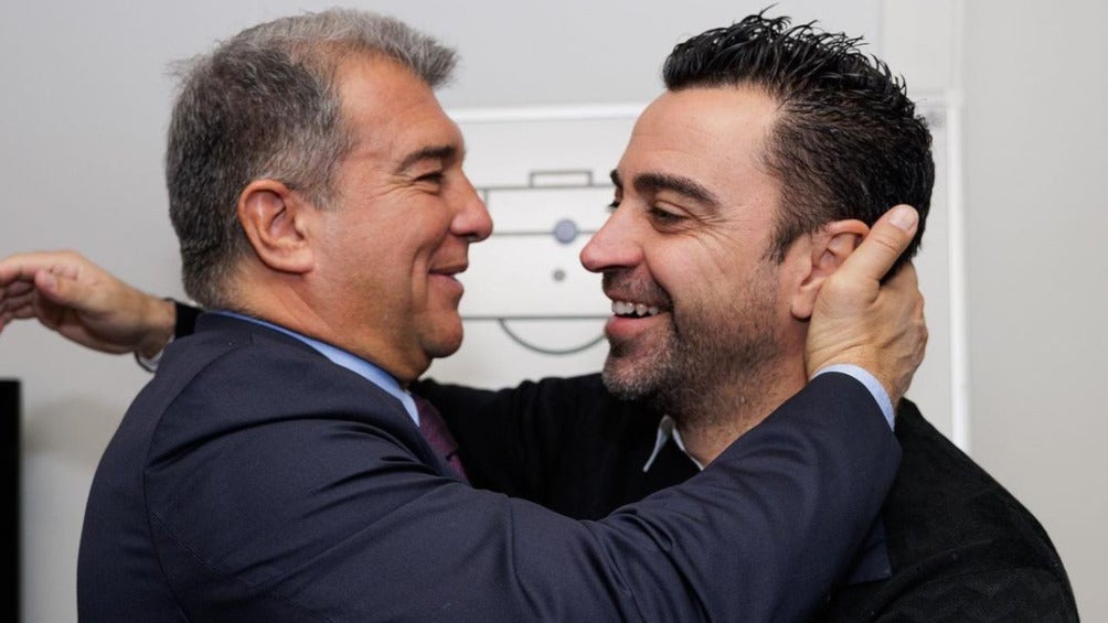 Joan Laporta y Xavi Hernández