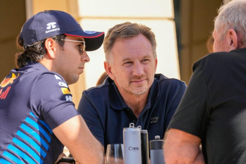 Checo y Horner con Helmut Marko