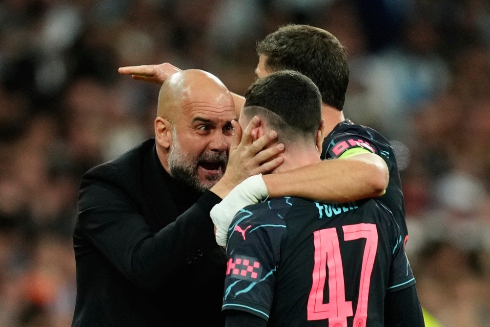 Guardiola con Foden en el Santiago Bernabéu