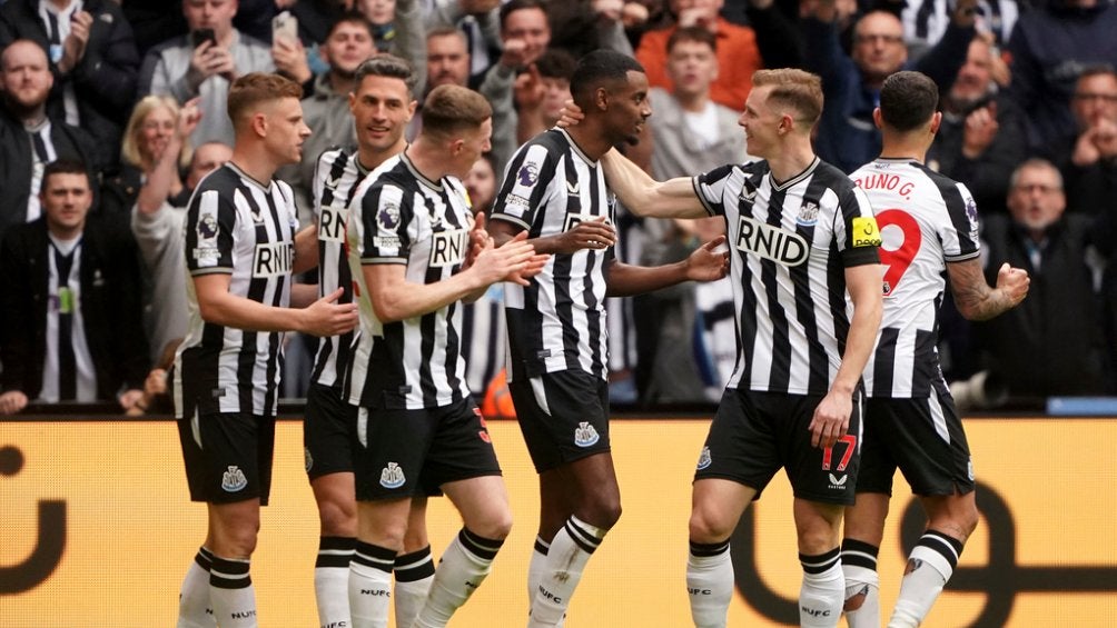 Newcastle thrashes Tottenham and clings to European places