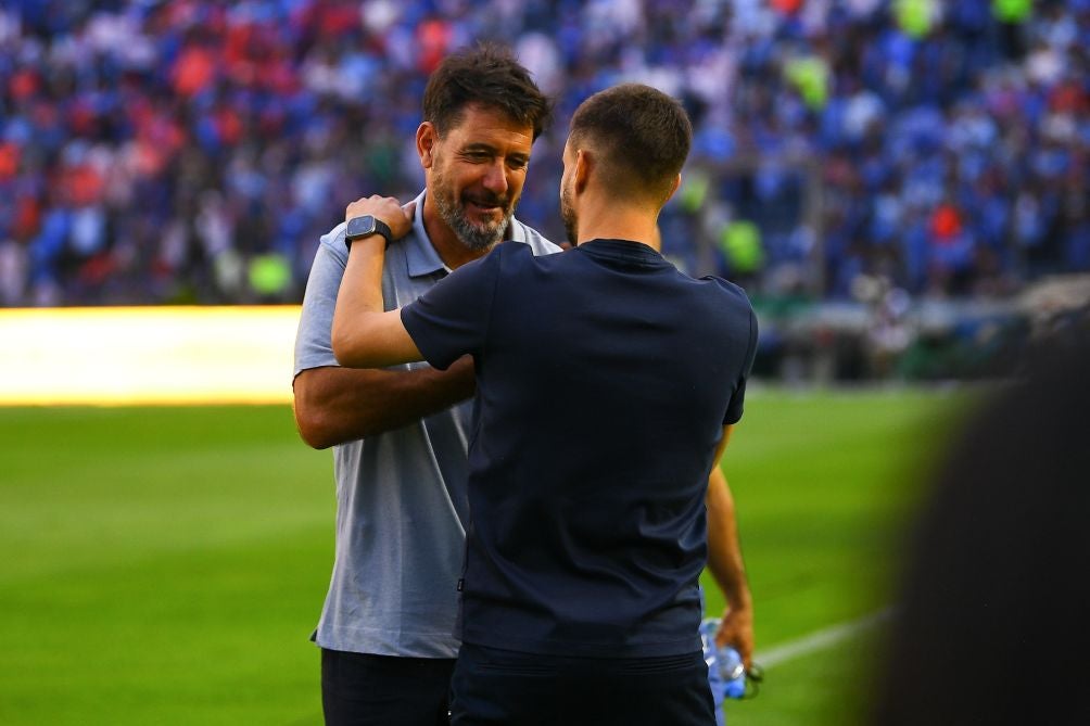 Lema con Anselmi antes del partido