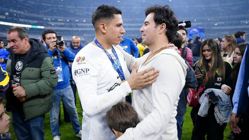 Sergio Pérez y Luis Ángel Malagón celebrando el título del América