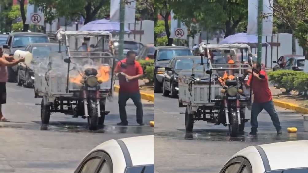 El dueño de la motocicleta intentaba sin éxito apagar el fuego. 