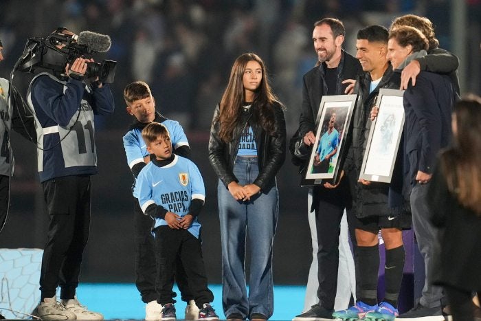 Suárez con Godín y Forlán