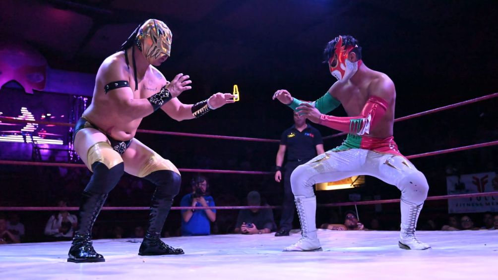 Lucha entre Spider Fly y Rock Power