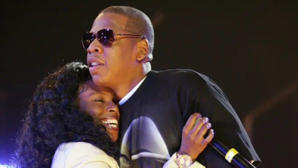 Jay.-Z abrazando a Foxy Brown