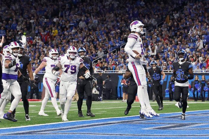 Josh Allen celebra un touchdown terrestre