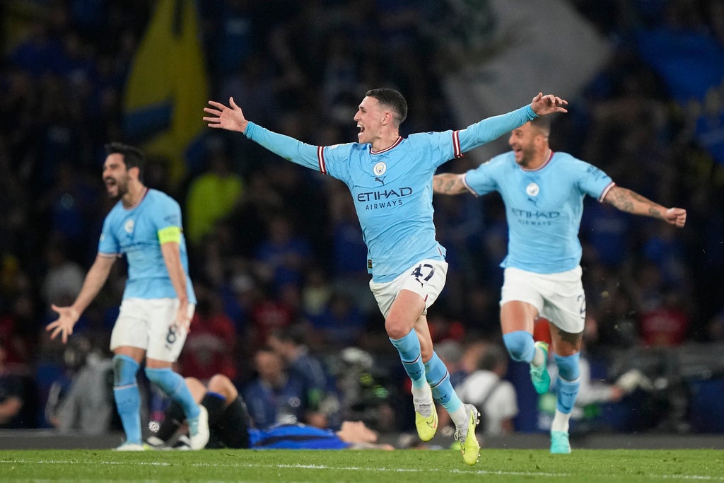 Jugadores del Manchester City celebrando la Champions League