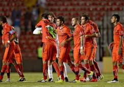 Los jugadores de Morelia festejan la victoria contra Gallos