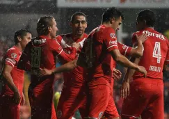 Jugadores del Toluca festejan un gol