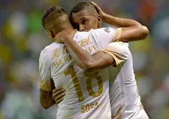 Sosa y Fidel festejan un gol contra León