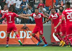 Jugadores de Toluca celebran un gol