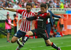 Alfonso González y Raúl López durante el Clásico Tapatío del C2016