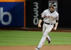 Conor Gillaspie corre después del cuadrngular