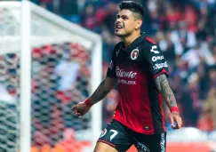 Gustavo Bou celebra una anotación con Xolos en Liga MX