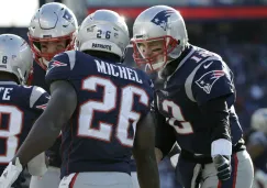 Jugadores de New England celebran anotación contra Chargers