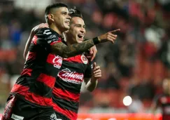 Jugadores de Xolos festejan un gol