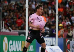 Fernando González celebra anotación contra Atlas