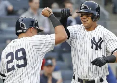 Jugadores de los New York Yankees festejan una carrera