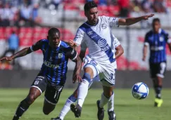 Fabián Castillo y Nestor Vidrio, durante el partido