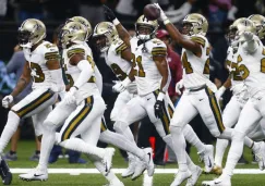 Jugadores de Saints, en festejo contra Dallas