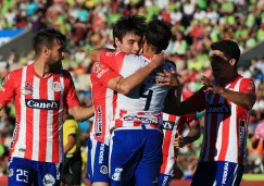 Jugadores de Atlético festejan gol