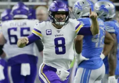 Kirk Cousins celebrando una anotación con Vikings