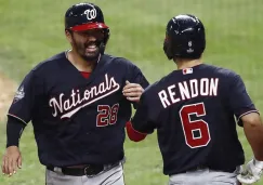 Kurt Suzuki y Anthony Rendon festejan en el Juego 1