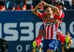 Jugadores del Atlético San Luis festejan un gol 