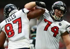 Jugadores de Texans celebran una jugada contra Jaguars