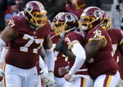 Dustin Hopkins durante el partido ante Lions