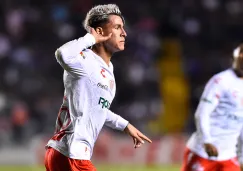 Cristian Calderón celebra un gol con Necaxa