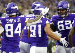 Jugadores de los Vikings festejan una jugada