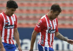 Jugadores de Atlético en lamento