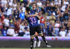 Marcel Ruiz y Enrique Triverio festejan un gol 