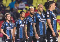 Jugadores de Querétaro durante un partido