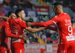 Jugadores de Necaxa festejan un gol