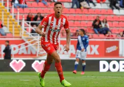 Mauro Quiroga celebrando un gol con Necaxa