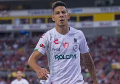 Mauro Quiroga durante un duelo con Necaxa