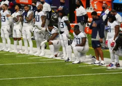 Jugadores de los Titans ante los Vikings