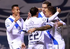 Jugadores del Puebla celebran gol vs San Luis