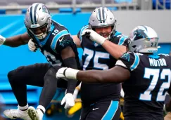 Jugadores de Panthers celebran TD vs Lions