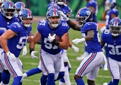 Jugadores de Giants celebran ante Bengals