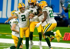 Jugadores de Packers celebran TD ante Lions