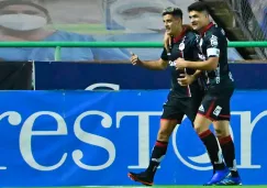 Nicolás Ibáñez y Berterame festejan un gol con el San Luis 