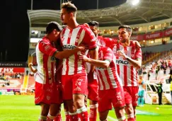 Jugadores del Necaxa en festejo de gol