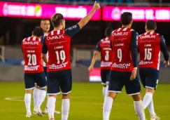 Jugadores de Chivas en festejo 