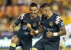 Castillo y Benedetti durante un partido con América