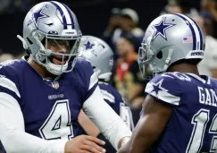 Prescott y Gallup celebran un touchdown